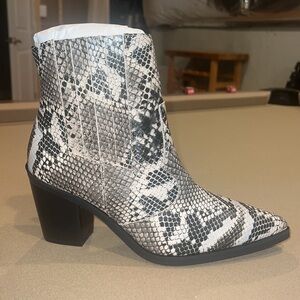 Snakeskin heeled booties